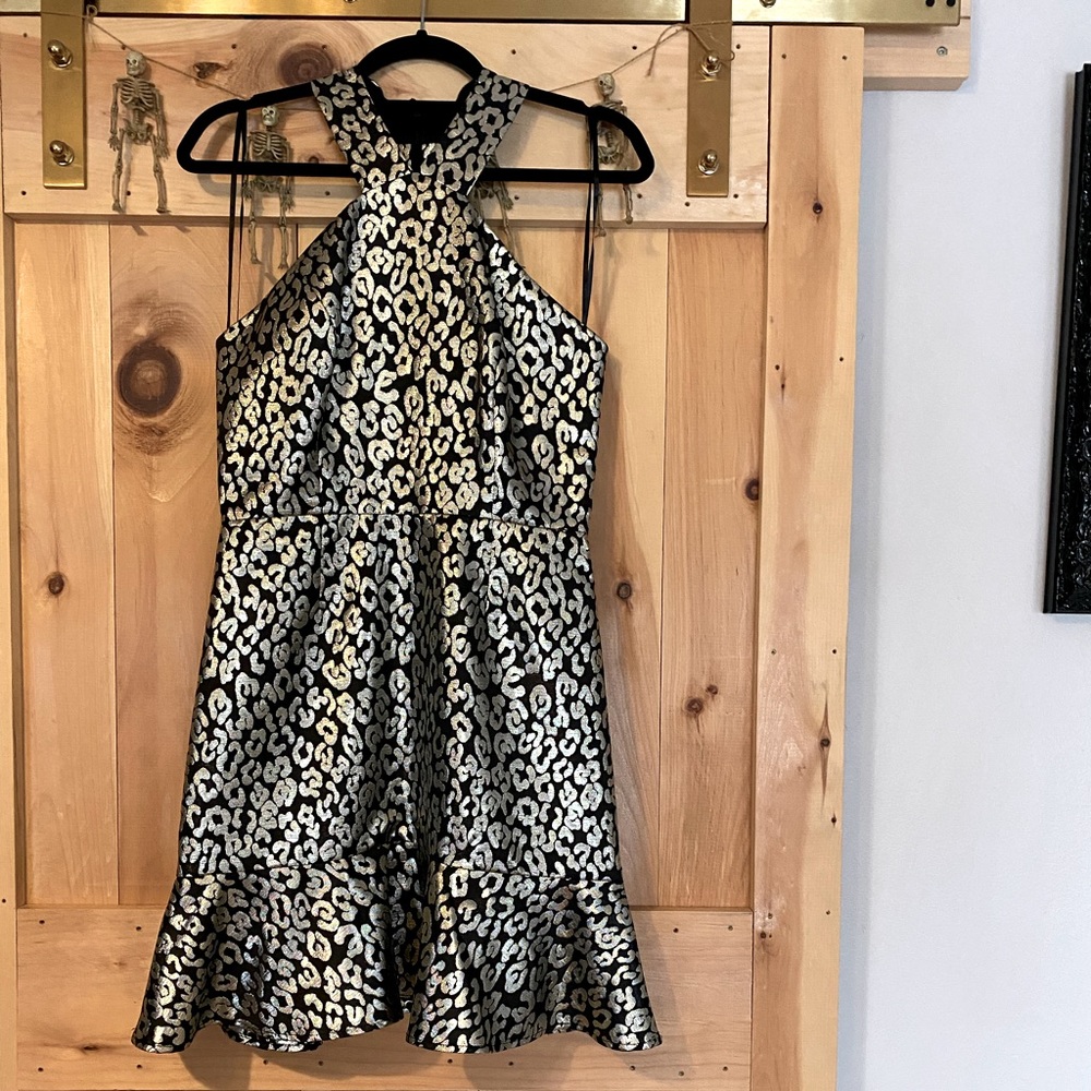 Anthropologie “Hutch” cocktail dress. Size 4. Black w/ gold cheetah thread.
